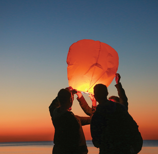 Shoreham-Wading River students and friends of Nick Donnelly light sky lanterns during a vigil at Shoreham Beach days after his death. This was a place where my friends gathered at that age. To return their under such heartbreaking circumstances was a surreal experience. The tribute from classmates was incredibly powerful. (Credit: Krysten Massa)