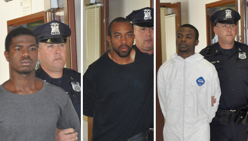 JOE PINCIARO PHOTOS | Ishawn Jackson, Jhmil Dawson and Lavon Dawson being escorted into town court Thursday.