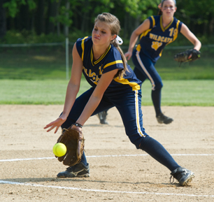 SWRMS ROBERT O'ROURK PHOTO | Shoreham-Wading River pitcher Chelsea Hawks fields the grounder. She threw a complete game shuout to earn the win for the Wildcats.