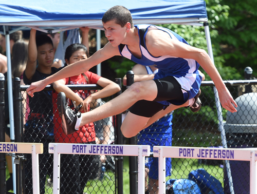 Riverhead's Ryan DiResta competes in the hurdles of the pentathlon. (Credit: Robert O'Rourk)