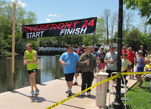 And they're off! Runners and walkers begin the fourth annual Riverfront 24, which raises money to help local veterans organizations. (Credit: Tim Gannon)