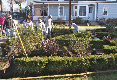 BARBARAELLEN KOCH FILE PHOTO | Riverhead Garden Club volunteers on East Main Street in 2011.