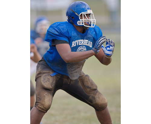 Ethan Greenidge, a 6-foot-5, 320-pound lineman, is one of Riverhead's three all-division players. (Credit: Garret Meade)