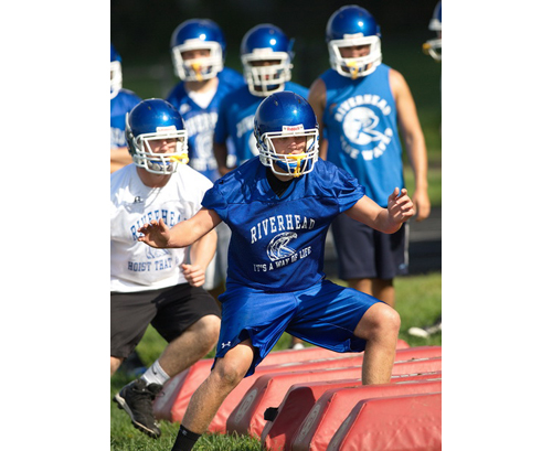 GARRET MEADE PHOTO | Mike Van Bommel was followed by Ryan Harkin during an agility drill on Monday morning.