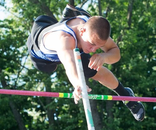 ROBERT O'ROURK PHOTO | Riverhead senior Dan Normoyle cleared 15 feet, breaking his own school record by 3 inches. He took first place while teammates Charles Villa (14-0) and Jonah Spaeth (14-0) were second and third, respectively.