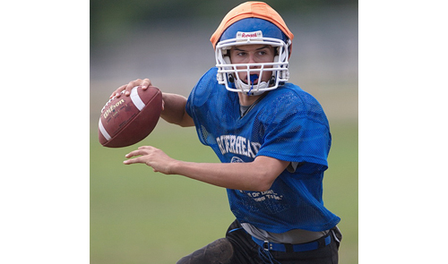 Kenny Simco, a senior quarterback, has a 4-0 record as a varsity starter. Last season he completed 39 of 55 passes for 439 yards and 5 touchdowns. (Credit: Garret Meade)