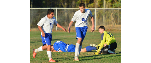 ROBERT O'ROURK PHOTO | After scoring Riverhead's fourth goal against Centereach, Jayson Set, left, is congratulated by Karol Birycki.