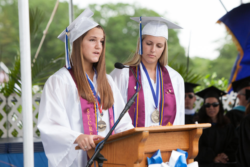 Class Secretary Joanna Messina and Amanda Baron, Treasurer, present the class gift of a willow tree.
