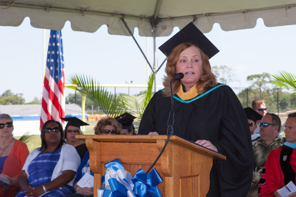 Superintendent Nancy Carney speaks at Riverhead High School's 2016 graduation ceremony. (Credit: Katharine Schroeder)