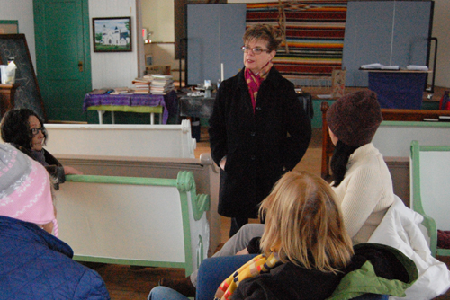 The Rev. Dianne Rodriguez (center) speaks with members of First Parish Church in Northville last week. (Credit: Cyndi Murray)