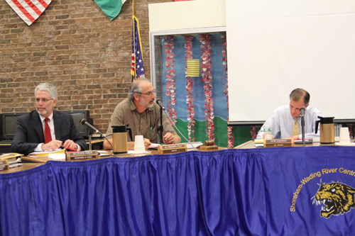 Shoreham-Wading River superintendent Steven Cohen (left) and school board members Bill McGrath and John Zukowski at last night's school board meeting. (Credit: Jennifer Gustavson)