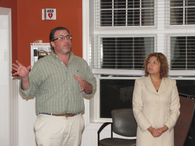 Riverside Rediscovered's new community liaison Siris Barrios, right, and Sean McLean of Renaissance Downtowns discussed plans to revitalize Riverside at Monday's meeting of the Flanders, Riverside and Northampton Community Association, where residents said they'd like to see a grocery store in the area. (Credit: Tim Gannon)
