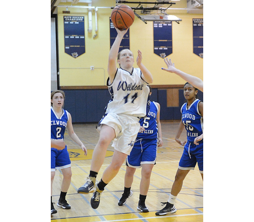 ROBERT O'ROURK PHOTO | Kari Gostic of Shoreham-Wading River passed Elwood/John Glenn defenders before putting up a shot.