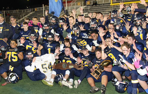Shoreham-Wading River honored the memory of a fallen player by winning its first Long Island championship last year and going 12-0. (Credit: Daniel De Mato, file)