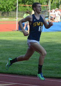 ROBERT O'ROURK PHOTO | Ryan Udvadia of Shoreham-Wading River made up ground quickly and surged to victory in the 3,200-meter final in 9 minutes 17.27 seconds.