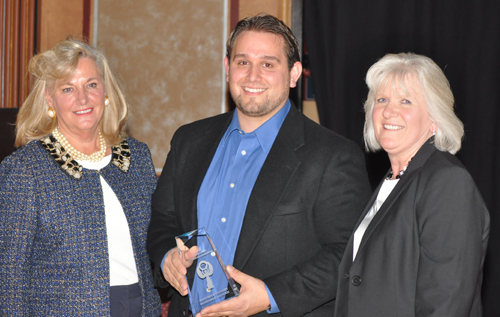 PAUL SQUIRE PHOTO | Award presenter Janine Nebons with Stony Brook Incubator assistant director Patrick Iacono and director Monique Gablenz.