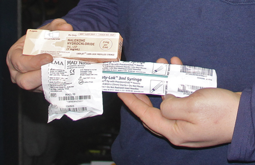 A Riverhead Volunteer Ambulance Corps volunteer displays the drug Narcan, which is used to treat opiate overdoses. (Credit: Paul Squire)
