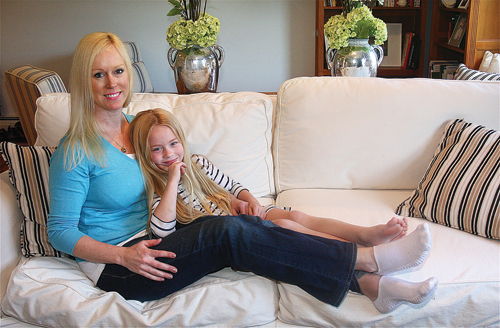 Five-year-old Claire McKenzie with her mother, Erica, at home in Laurel last month. (Credit: Barbaraellen Koch)