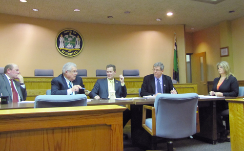 Riverhead councilman John Dunleavy (second from left) argues with Supervisor Sean Walter (middle) during Thursday's work session.