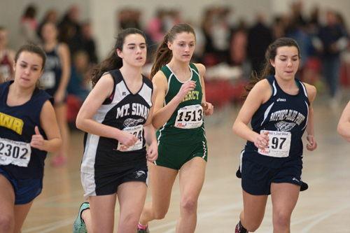 GARRET MEADE PHOTO | McGann-Mercy senior Caitlyn Walsh races in the 1,000 with Shoreham freshman Christy Capek.