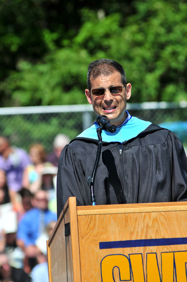 Presentation of the diplomas from principal Dan Holtzman. (Credit: Bill Landon)