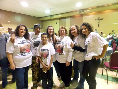 JOSEPH PINCIARO PHOTO | Family members of Justin Walker at Friday night's fundraiser: Kristy Fink, Miranda Walker, Matthew Walker, Jeanette Fink, Kathi Gentile, Sharon Ford, Katie Gentile.
