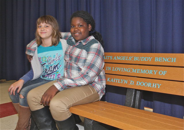 Fourth graders Samantha Davis and Ja'Dah William became friends Friday at recess. Samantha told the principal Phil Kent she was having trouble making friends. (Credit: Barbaraellen Koch)
