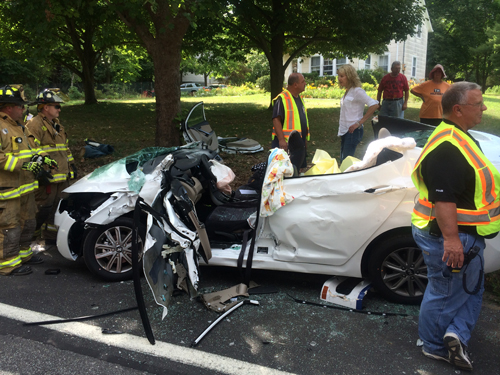 The driver of this sedan was airlifted to Stony Brook Medical Center on Thursday afternoon. (Credit: Riverhead Fire Department)
