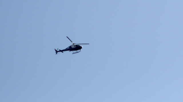 A Suffolk Police helicopter assisted firefighters from the air. (Credit: Jen Nuzzo)