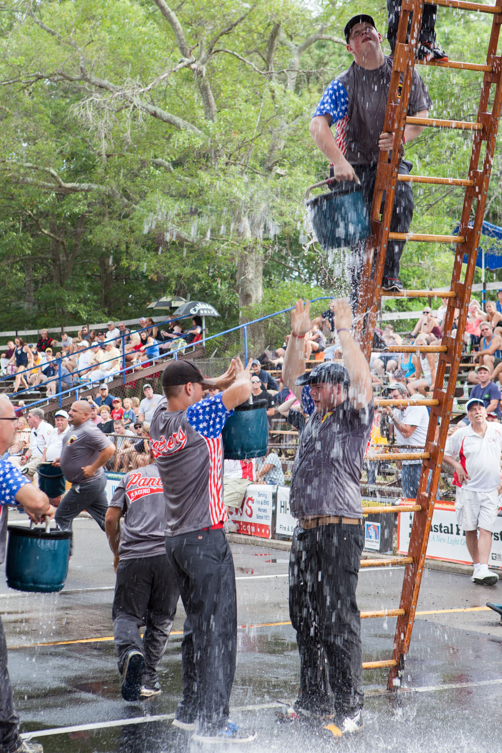 Riverhead Ironmen in bucket brigade competition.