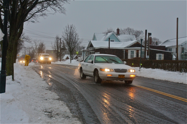 Cars driving through Polish Town Monday. (Credit: Barbaraellen Koch)