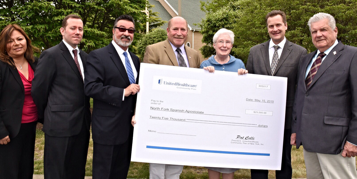 (L-R) United Healthcare’s Juliette Serrano and Robert McBrien; Pat Celli, United Healthcare Community Plan of New York president; Riverhead Councilman James Wooten; Sister Margaret Smyth; Riverhead Town Supervisor Sean Walter and Riverhead Councilman John Dunleavy. (Credit: courtesy)
