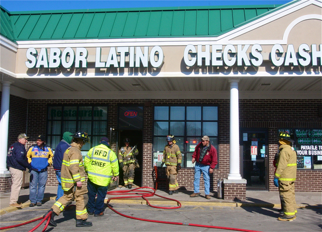 Firefighters put out a grease fire in Jamesport Tuesday morning. (Credit: Barbaraellen Koch)
