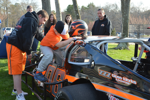 Local kids lined up to get behind the wheel. (Credit: Melanie Drozd)
