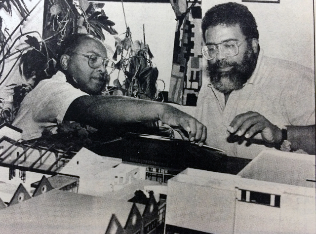 Butch Langhorn, left, and Rev. Charles Coverdale review the model of the Family Community Life Center. (Credit: Glenn Jochum, 1989)