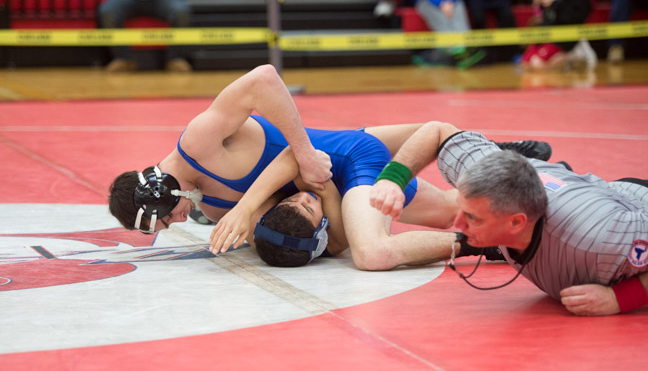 Riverhead senior Ed Matyka pins David Hararah of Copaigue in the preliminaries Saturday of the League III Tournament. (Credit: Robert O'Rourk)