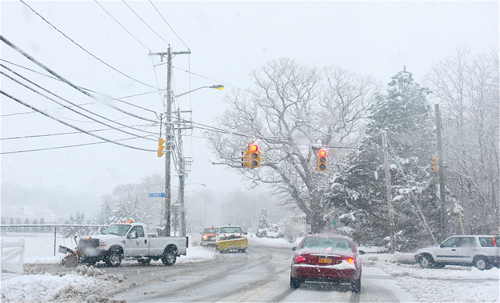 Riverhead Town plows on Middle Road Monday afternoon. (Barbaraellen Koch Photo)