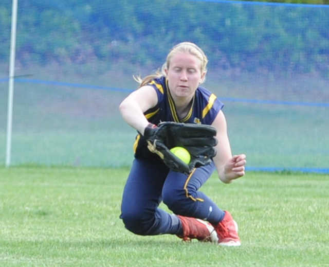 Shoreham-Wading River center fielder Caitlin Mirabell charges in to make a catch Wednesday against Comsewogue. (Credit: John O'Rourk)