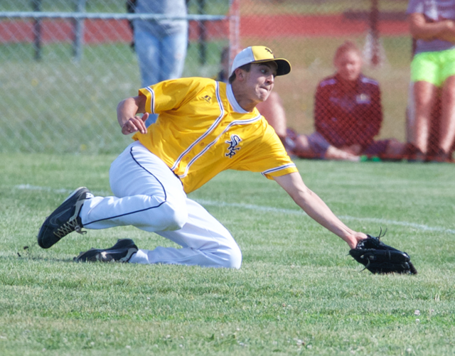Shoreham right fielder John Montesano makes a sliding catch along the foul line in the fourth inning. (Credit: Robert O'Rourk)