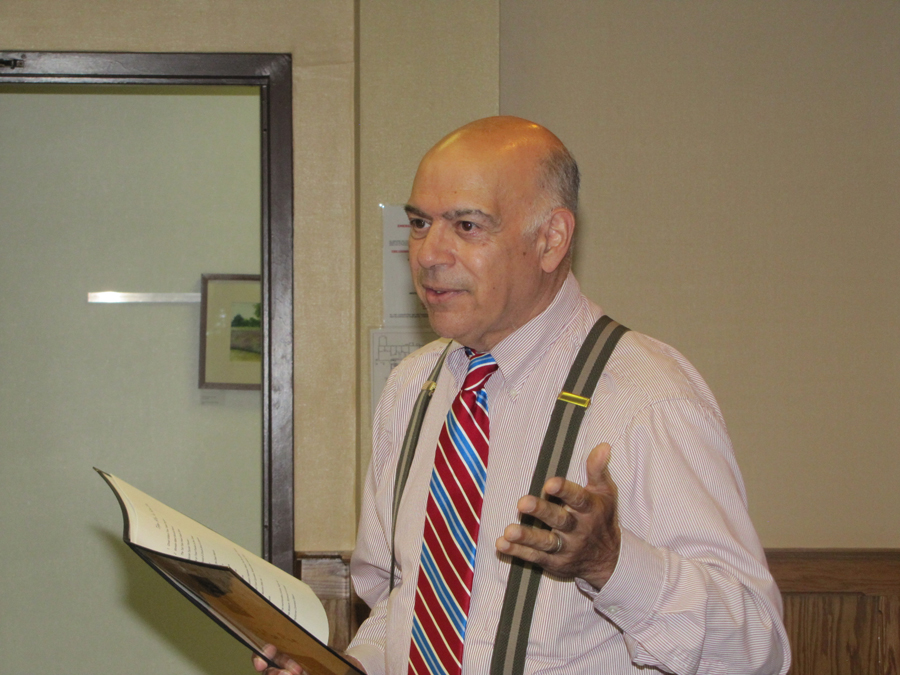 Sal St. George making his Edgar Allen Poe Festival pitch to business leaders in Riverhead Town Hall Wednesday. (Credit: Tim Gannon)