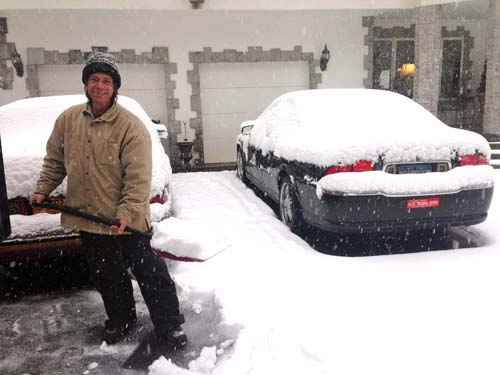 JOSEPH PINCIARO PHOTO | Phil Mondello of Wading River shovels out his driveway Monday morning.
