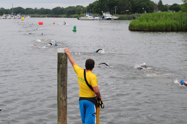 Swimmers race in the Riverhead Rocks Triathlon Sunday morning. (Credit: Bill Landon)