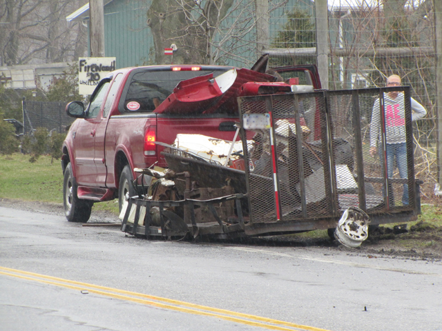 Debris from the truck's trailer ended up on the road. (Credit: Tim Gannon)