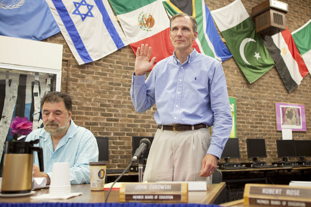 John Zukowski was sworn in last night as the SWR school board president. (Credit: Chris Lisinski)