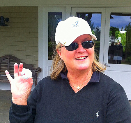 LEIGH NOTLEY PHOTO | Dede Gray with her hole-in-one ball.