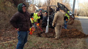 JULIE LANE PHOTO | Highway Department workers braved freezing temperatures early Friday morning to plant trees along Cobbetts Lane as part of a joint project between Friends of Trees and the town.