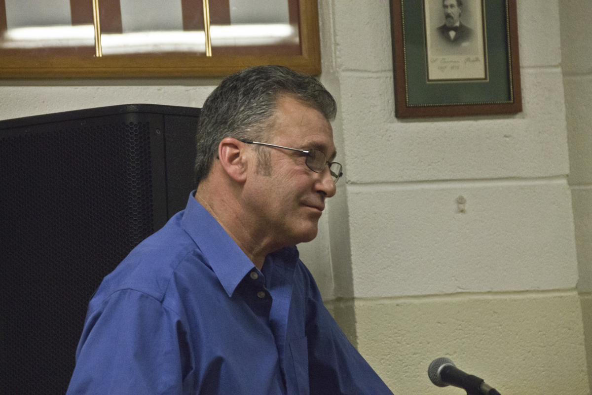North Fork Smoked Fish Co. owner Phil Karlin addresses the Greenport Planning Board Thursday night. (credit: Paul Squire)