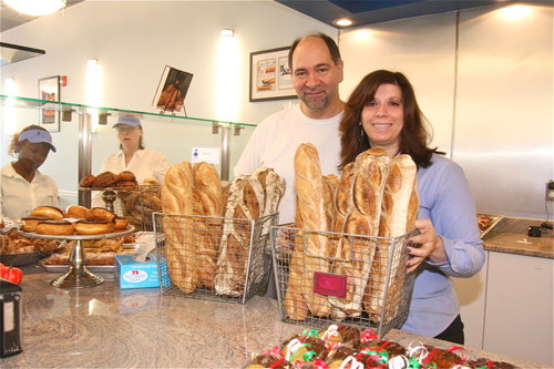 BARBARELLEN KOCH FILE PHOTO | Blue Duck Bakery owner Keith Kouris (left) confirmed this week he's looking to open up his fourth location downtown Greenport.