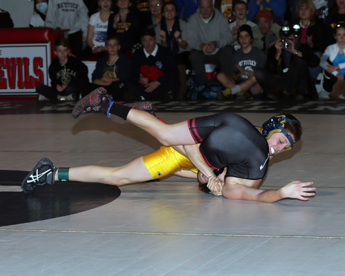 Jack Bokina of Mattituck defeated Donald Wood of Center Moriches in the 99-pound weight class. (Photo credit: Daniel De Mato)