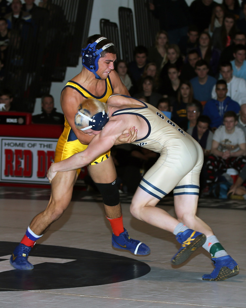 Bobby Becker of Mattituck defeated Joe Palma of Bayport-Blue Point in the 138-pound weight class. (Photo credit: Daniel De Mato)